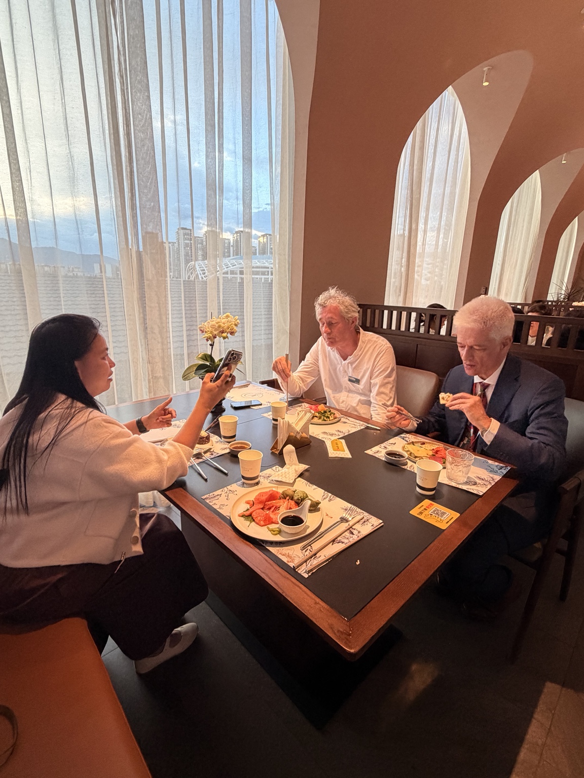 EMV representative and Dutch colleagues sharing a meal in Kunming